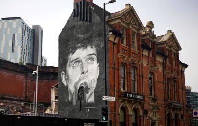 Ian Curtis Manchester mural recreated at new site in time for World Suicide Prevention Day - www.nme.com - Manchester