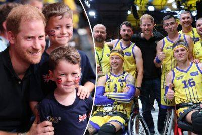 Prince Harry hits third day of Invictus Games as Meghan Markle jets off to Europe - nypost.com - Britain - Los Angeles - Ukraine - Germany