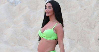 Pregnant Chelsee Healey shows off blossoming baby bump in neon green bikini on holiday - www.ok.co.uk - county Ross - county Metcalfe - Portugal - county Adams