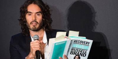 Russell Brand's Book Deal Paused, Literary Agency & Charity Cuts Ties Amid Sexual Assault Allegations - www.justjared.com - county Wood
