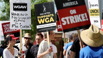 WGA Picket Lines Swell with Solidarity and Cautious Optimism as AMPTP Contract Talks Go a Third Day with CEOs - variety.com - Los Angeles - Hollywood