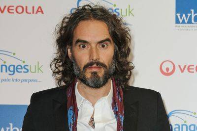 Russell Brand Sounds Desperate For Money Amid Assault Allegations -- Expecting Prosecution?? - perezhilton.com - Greece