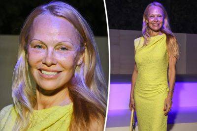 Pamela Anderson stuns while makeup-free at Paris fashion week - nypost.com