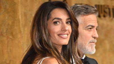 Amal Clooney Looked Like a Versace Bride at the Clooney Foundation Gala - www.glamour.com - Italy - city Venice