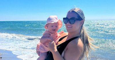 Shaughna Phillips says 'I'm not pregnant' as she poses on holiday with baby Lucia - www.ok.co.uk