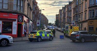 Two men found injured inside flat after police race to disturbance in Glasgow - www.dailyrecord.co.uk - Scotland - Florida - Beyond