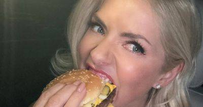 Holly Willoughby eats burger and poses with The Repair Shop's Jay Blades after NTA loss - www.ok.co.uk