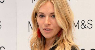 Pregnant Sienna Miller gives glimpse at baby bump as she launches M&S collection - www.ok.co.uk - Britain