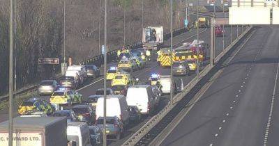 Air ambulance lands on motorway as woman rushed to hospital after horror crash - www.dailyrecord.co.uk