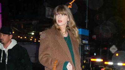 Taylor Swift's Green Sweater Dress and Brown Coat Combo Screams 'Evermore' to Me - www.glamour.com - New York
