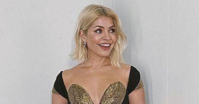 Holly Willoughby's most glamorous Dancing On Ice looks including 'jaw dropping' plunging gown - www.ok.co.uk