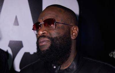 Rick Ross goes viral for throwing stack of money at man’s face after being hit with bills - www.nme.com