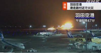 Japan Airlines plane 'carrying 300 passengers' on fire after landing at Haneda airport - www.manchestereveningnews.co.uk - Japan - Tokyo