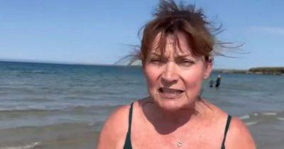 Lorraine Kelly wows as she strips off for cold water swim in freezing temperatures - www.ok.co.uk - Scotland