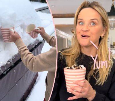 Reese Witherspoon Hits Back At Fans Grossed Out Over Her Eating Snow Off Her Car! - perezhilton.com