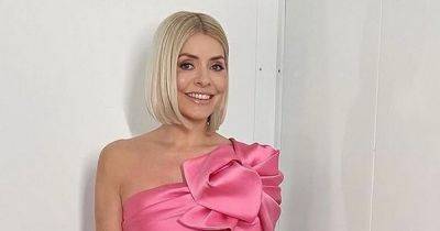 Holly Willoughby stuns in pink dress ahead of Dancing on Ice after TV comeback - www.ok.co.uk - Italy