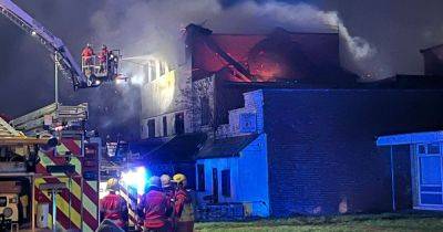 "It was massive." Fire crews rush to Wigan road following huge fire at derelict hotel - www.manchestereveningnews.co.uk - Manchester