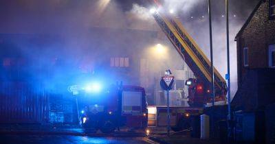 Events firm issues statement after 'devastating' fire rips through premises as residents hear 'explosions' - www.manchestereveningnews.co.uk