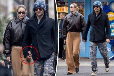 Gigi Hadid and Bradley Cooper hold hands in first PDA photos as romance heats up in London - nypost.com - London - New York - Italy - county Lea