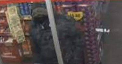 Urgent CCTV appeal after man bursts into Morrisons store armed with knife - www.manchestereveningnews.co.uk