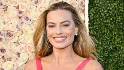 Margot Robbie's Golden Globes Dress May Be Her Best Barbie-Inspired Look Yet - www.glamour.com