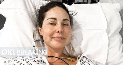 Louise Thompson shares snap from hospital bed as she reveals she was losing 'cups of blood' on holiday - www.ok.co.uk
