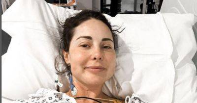 Louise Thompson shares photo from hospital bed after losing 'cups of blood' on holiday - www.manchestereveningnews.co.uk - Chelsea