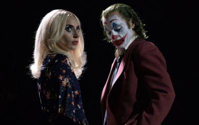 ‘Joker: Folie à Deux’: Joaquin Phoenix and Lady Gaga dance in new images - www.nme.com