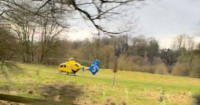 Air ambulance lands in park after cyclist seriously hurt in crash - www.manchestereveningnews.co.uk