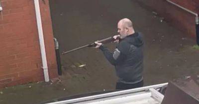 Man with 'fire, fire' sign shot rifle at police after torching his own flat - www.dailyrecord.co.uk - county Newport