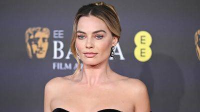 Margot Robbie Gave Her Barbie Style a Goth Twist on the 2024 BAFTAs Red Carpet - www.glamour.com - Britain - county Hall - city Seoul
