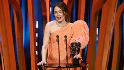 Emma Stone Thanks ‘Poor Things’ Screenwriter for ‘I Must Go Punch That Baby’ Line in BAFTAs Speech: ‘It Was Life-Changing’ - variety.com - Britain - USA - city Sandra