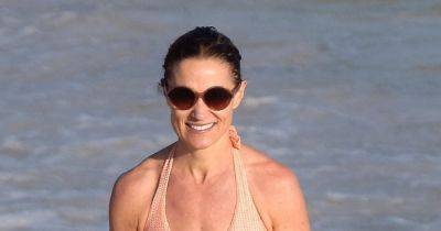 Pippa Middleton wows in peach bikini in St Barts while sister Kate recovers at home - www.ok.co.uk