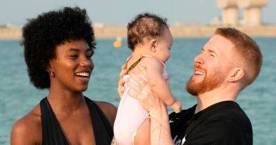 Strictly's Neil Jones and Love Island's Chyna Mills dote on baby Havana as they play on the beach - www.ok.co.uk - Britain - Dubai - city Havana