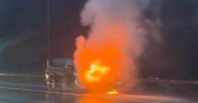 Car bursts into flames on M8 near Glasgow as smoke causes chaos for drivers - www.dailyrecord.co.uk - Scotland