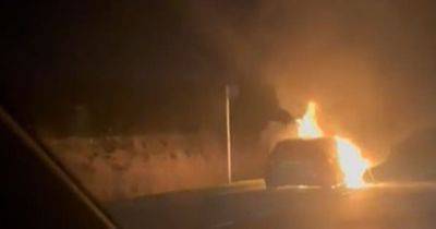 Dramatic footage shows car engulfed in flames on A9 as fire crews race to scene - www.dailyrecord.co.uk - Scotland - Beyond