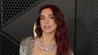Dua Lipa Is a Sparkly Disco Ball on the Grammys Red Carpet - www.glamour.com - Britain