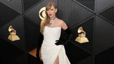 Taylor Swift Wears Reputation-Esque Schiaparelli Gown to the 2024 Grammys - www.glamour.com