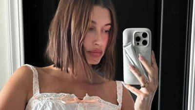 Hailey Bieber Teased New Rhode Lip-Gloss-Holder Phone Case in a Coquette Set - www.glamour.com