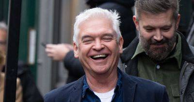 Phillip Schofield in high spirits as he laughs and smiles with friends amid This Morning news - www.ok.co.uk - Britain - London - USA