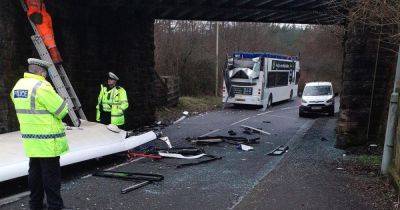 Top of double decker bus torn off as driver hits low West Lothian bridge - www.dailyrecord.co.uk