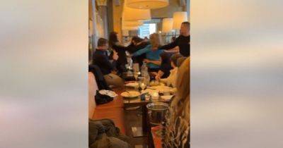 "She's punching her head in!": Video captures Mother's Day brawl in packed restaurant - www.manchestereveningnews.co.uk - Jamaica - city Liverpool