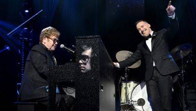 Elton John Delivers Exclusive Performance and Raises $10.8 Million for AIDS Foundation at Annual Oscars Party - variety.com - county Stone