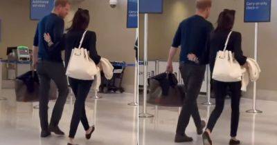 Meghan Markle 'steers' Prince Harry in 'dominant' way as they're seen passing through airport - www.ok.co.uk - Texas - city San Antonio - county Uvalde