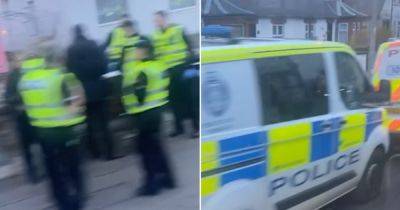 Huge police presence swoops on Scots town as cop vehicles line street - www.dailyrecord.co.uk - Scotland