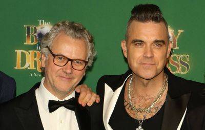 Robbie Williams songwriter Guy Chambers hits out at AI in the music industry - www.nme.com