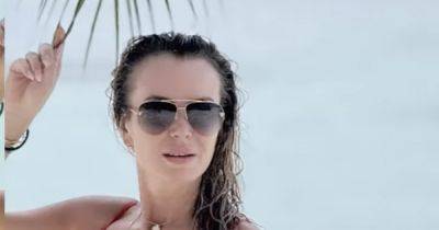 Amanda Holden, 53, continues to show off incredible curves in red bikini on family holiday - www.ok.co.uk - Britain