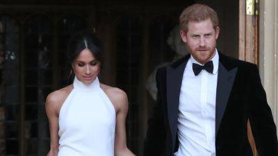 Meghan Markle Gives Prince Harry a Kiss While Wearing a Nod to Her Second Wedding Dress - www.glamour.com - Britain