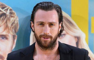 Aaron Taylor-Johnson swerves James Bond question on red carpet - www.nme.com - London