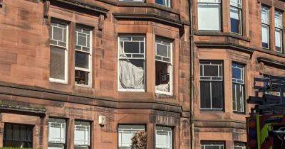 Man dies after horror Glasgow tenement flat blaze in early hours - www.dailyrecord.co.uk - Scotland - Beyond